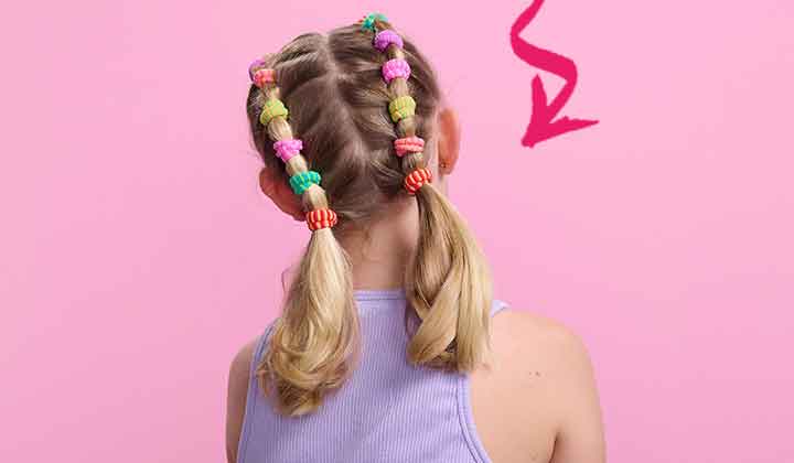 Image of Low ponytail with a scrunchie hairstyle for school girls